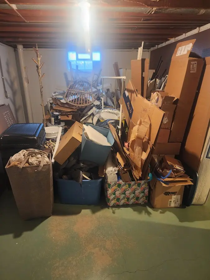 Roll-off dumpster container at job site for 15 Yard Dumpster Rental in Sugar Hill